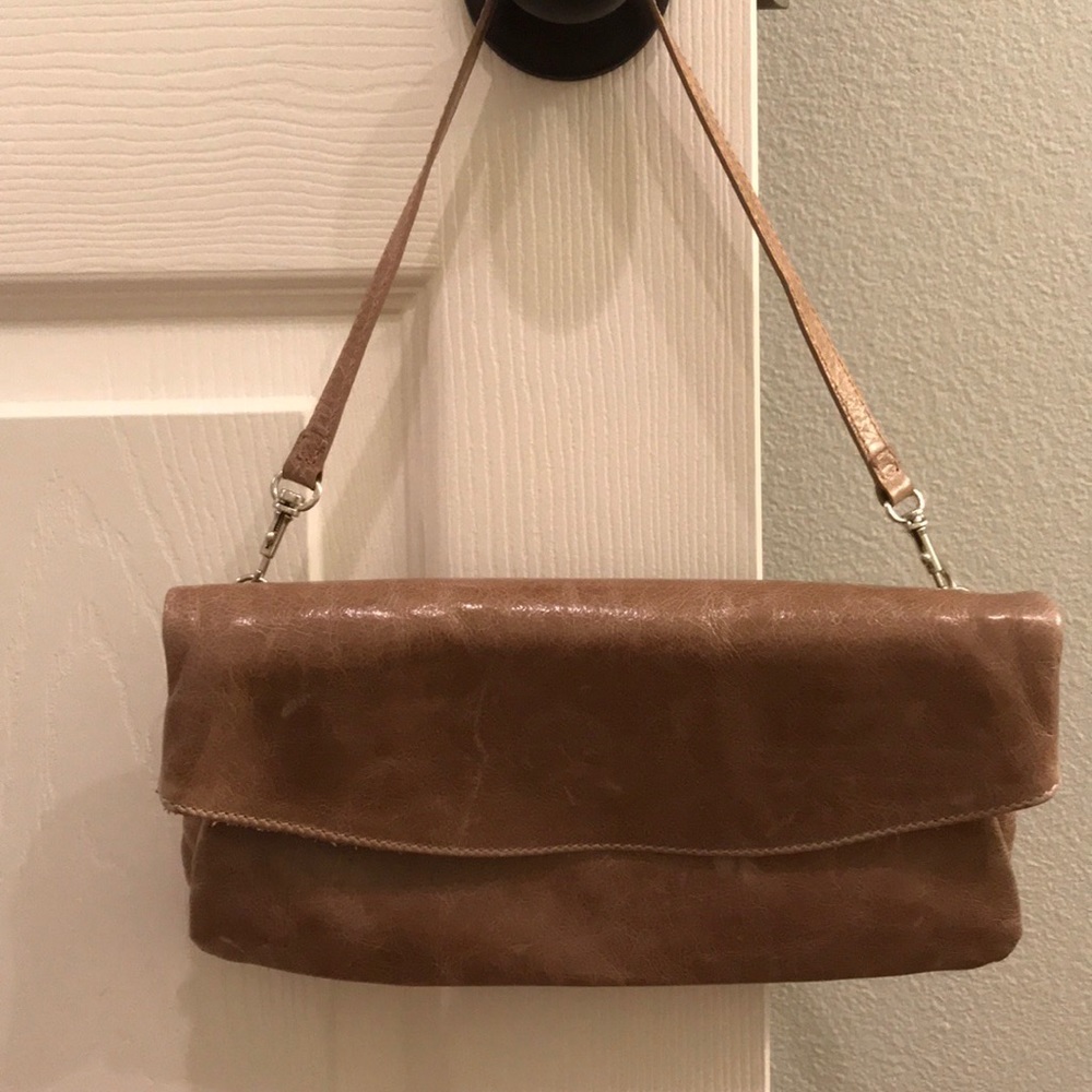 Gianni chianni tan leather clutch wristlet.